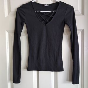 Black ribbed criss cross lace up tie neck long sleeve top